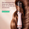 Ovale titanium borstel met gelijkmatige warmteverdeling voor glanzend en gezond uitziend haar.